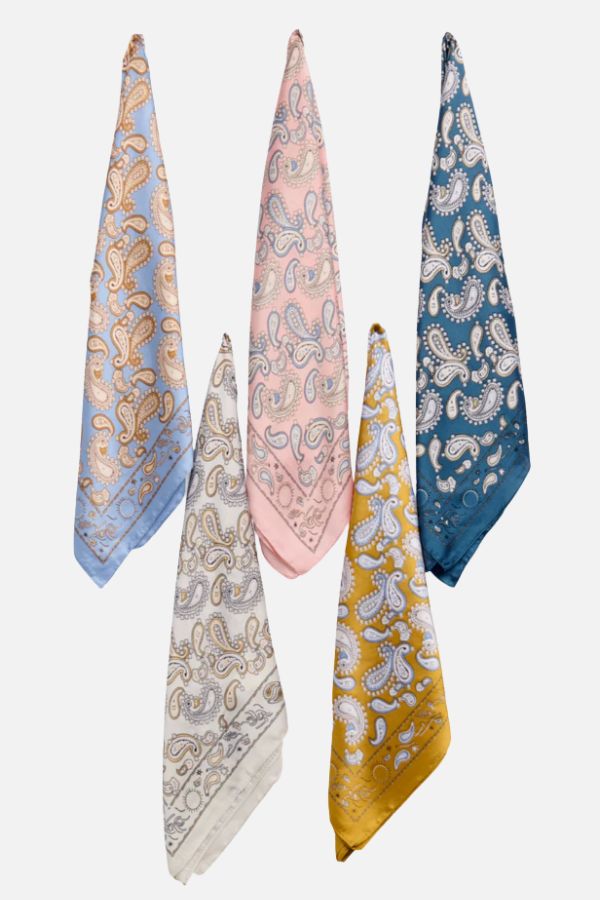 15 Memphis FINDS at Local Shops: Spring Dresses, Home Decor & More! - 11 Five paisley-patterned bandanas in blue, pink, dark teal, cream, and yellow from Memphis FINDS April, displayed against a plain white background.