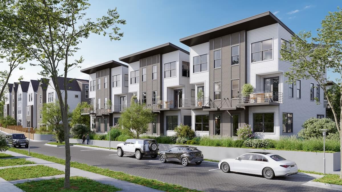 Modern three-story homes with balconies, large windows, and landscaped front yards line a clean, tree-lined street in East Nashville, showcasing new developments and convenient parking.