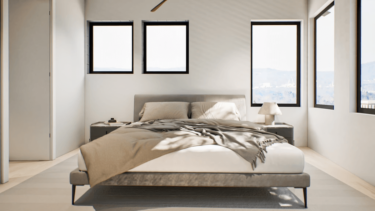 A modern, minimalist bedroom in East Nashville featuring a neatly made bed, two nightstands, a lamp, and three windows that fill the space with natural light—perfect for stylish urban homes or new developments.
