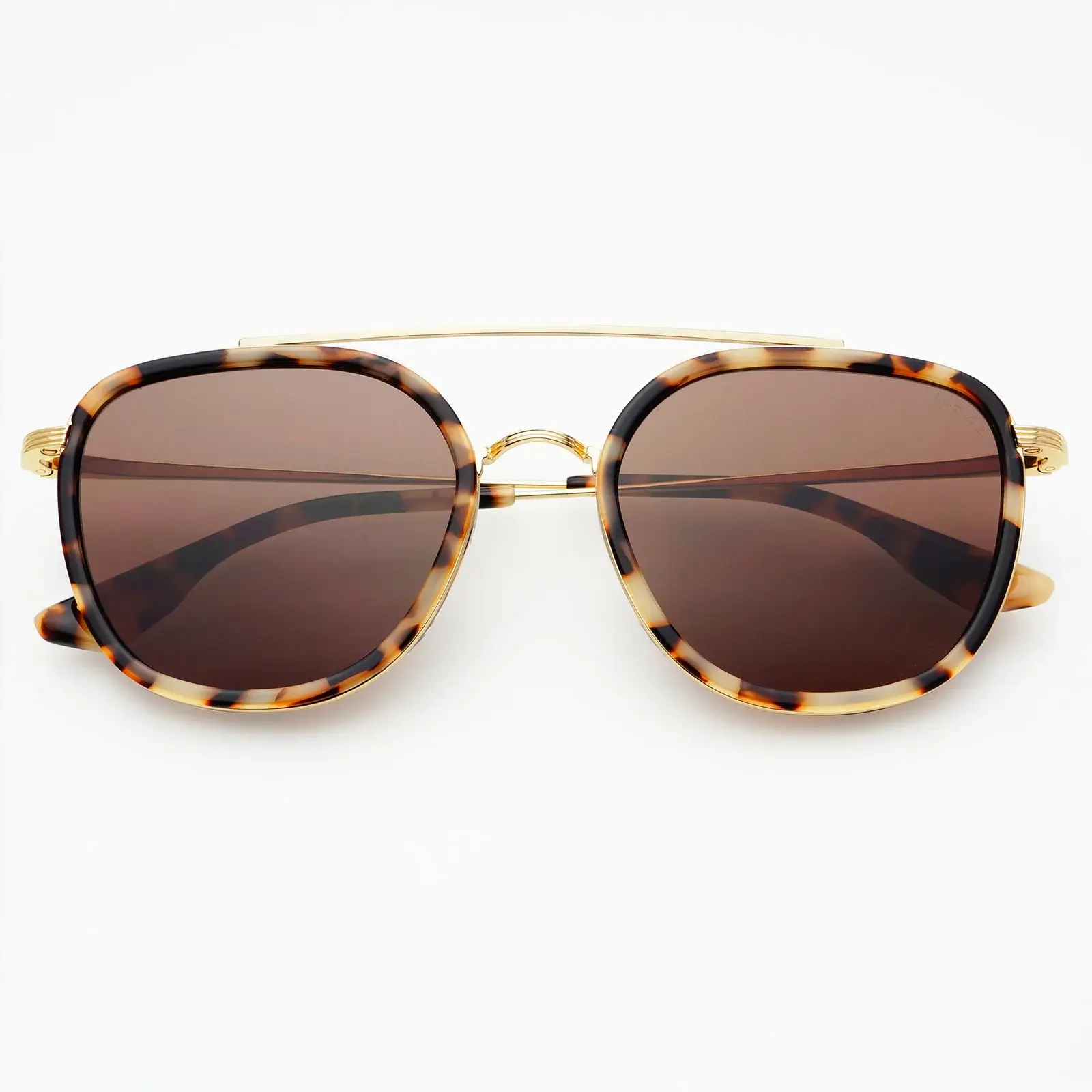 A pair of tortoiseshell sunglasses with brown tinted lenses and a gold metal bridge, perfect for elevating your summer style, displayed on a white background.