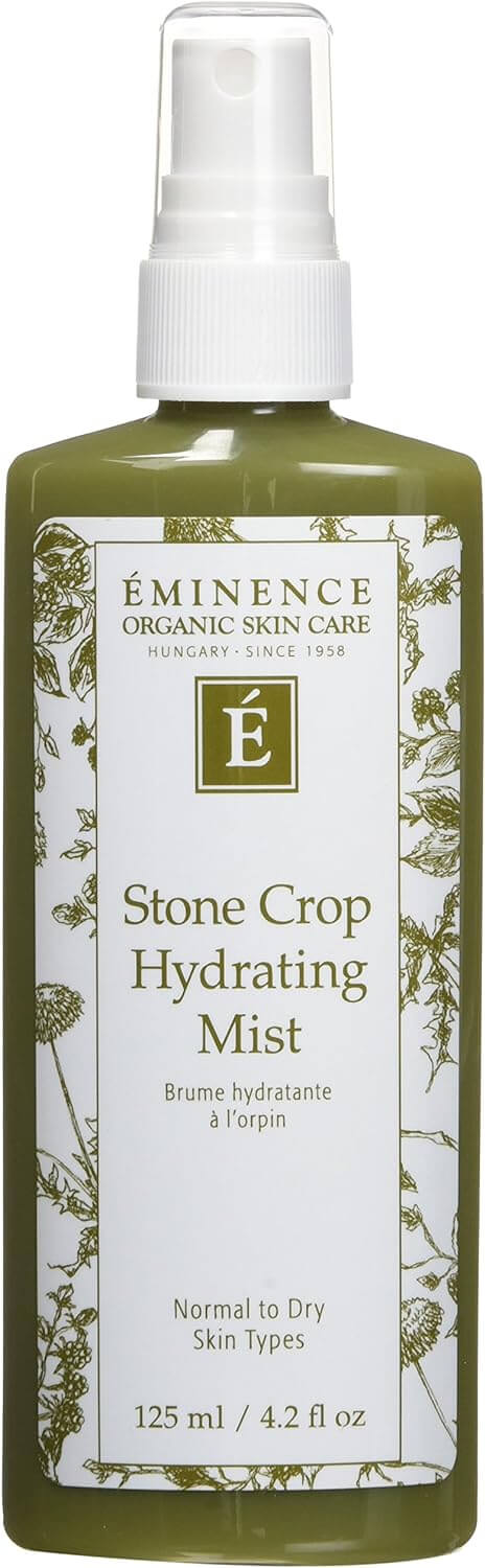 The 5 Best-Smelling Skincare Products I Can't Live Without - 1 A green bottle of Éminence Organic Skin Care Stone Crop Hydrating Mist, known as one of the best-smelling skincare products, with a white spray cap; labeled for normal to dry skin types, 125 ml (4.2 fl oz).