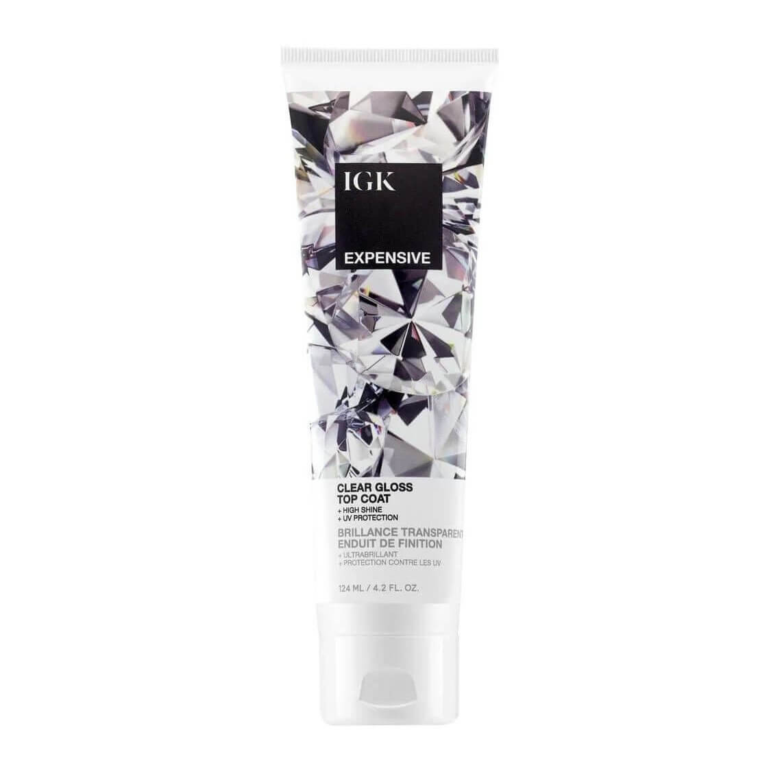 A white tube labeled "IGK Expensive Clear Gloss Top Coat" with a diamond pattern design, featured on the SB Hot List and perfect for Spring 2025. Contains 136 ml (4.2 fl oz) of product.