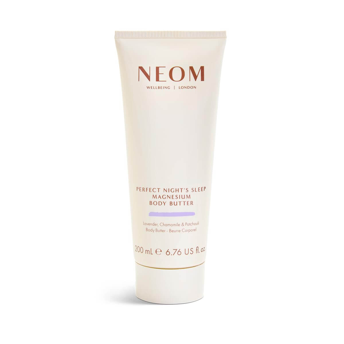The 5 Best-Smelling Skincare Products I Can't Live Without - 7 A white tube of NEOM Perfect Night’s Sleep Magnesium Body Butter, 200 mL, with lavender, chamomile, and patchouli—one of the best-smelling skincare treats—stands upright on a white background.