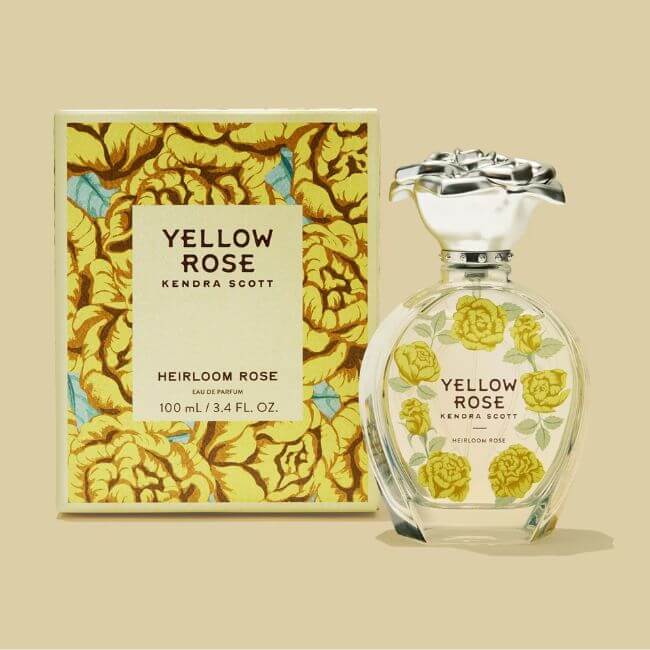 20 Spring FINDS for Mother’s Day & Beyond: Style, Beauty & Home Must-Haves - 10 A bottle of Yellow Rose Heirloom Rose Eau de Parfum by Kendra Scott is shown next to its matching floral-patterned box, a charming find at select Nashville shops.