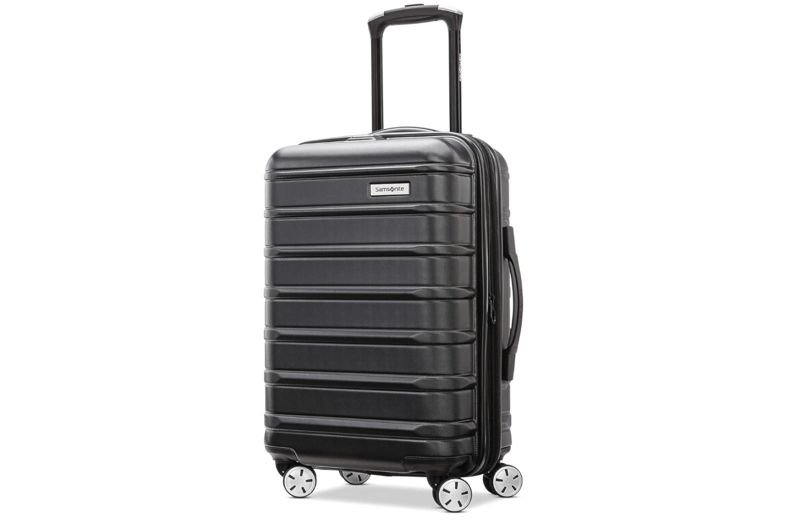 A black hard-shell Samsonite suitcase, one of the best luggage pieces for travel, features four spinner wheels and a telescoping handle, shown upright against a white background.