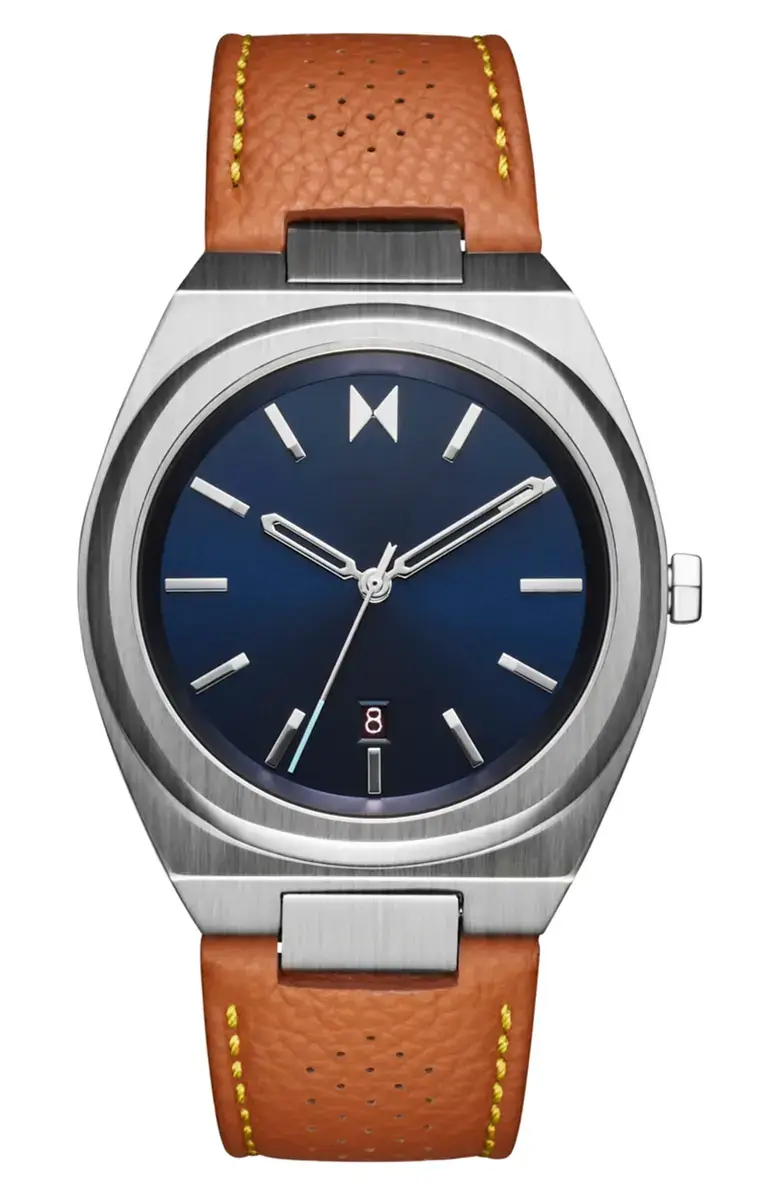 A stainless steel wristwatch with a blue face, brown leather strap with yellow stitching, silver hour markers, and a date display at 6 o’clock—an ideal Father’s Day gift for any luxury gifts guide.