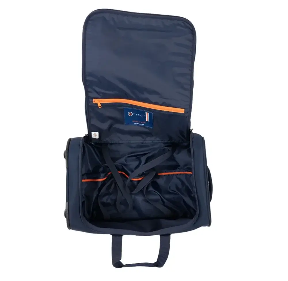 A navy blue travel bag with its main compartment open, featuring an orange zipper pocket and interior tag—an excellent pick for the Father’s Day Gift Guide, perfect for the golf-loving dad on the go.