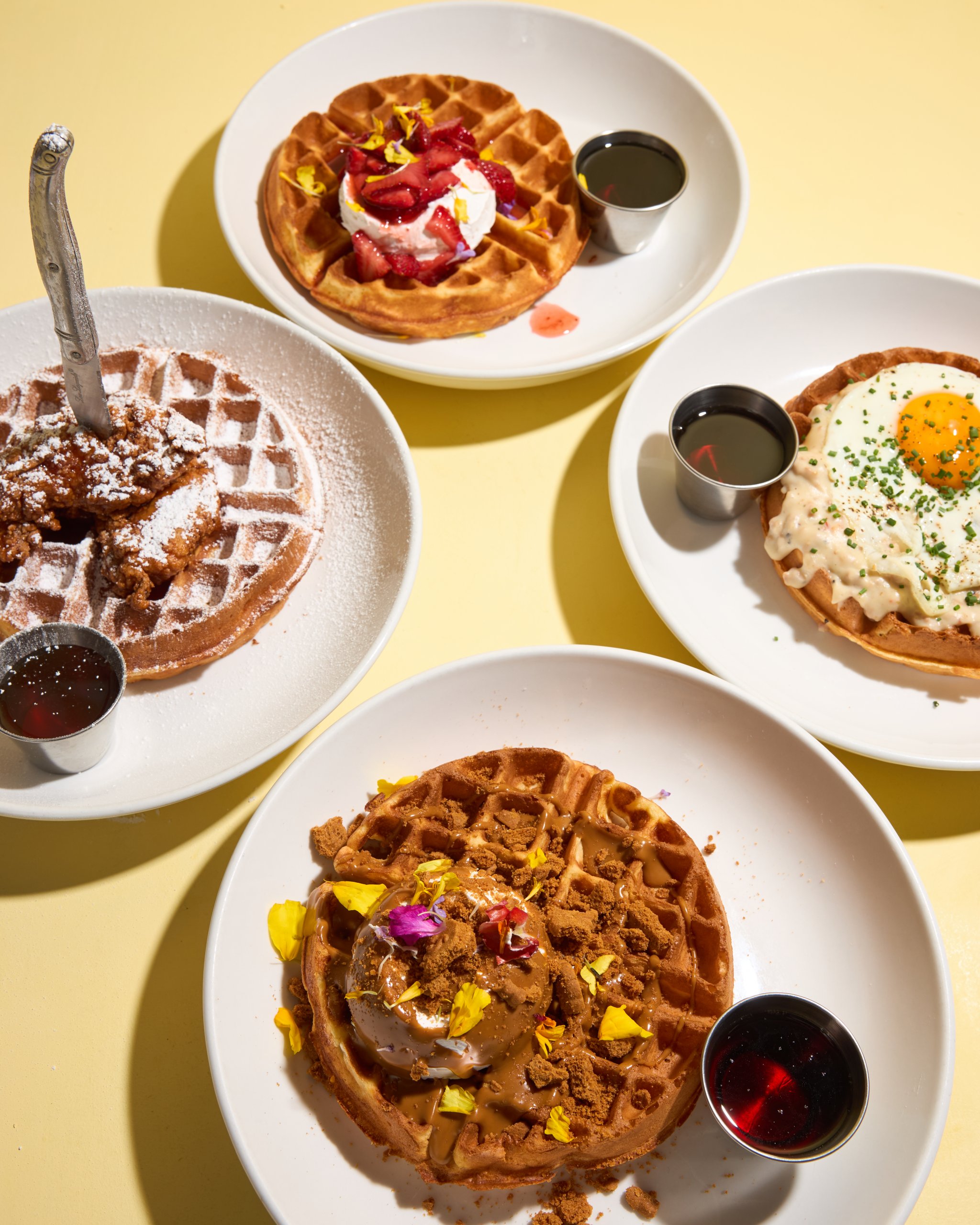 3 New Louisville Restaurants (+2 New Menus!) to Try This Month - 5 Four plates of breakfast dishes, including decadent waffles.