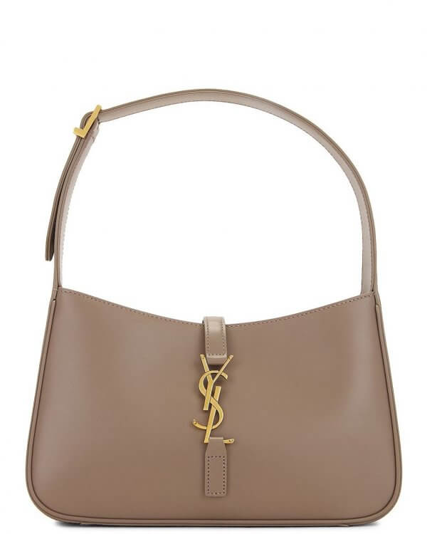 A luxury taupe leather shoulder bag with a structured shape and gold YSL logo hardware on the front flap, perfect for stylish outings in Memphis or summer events in July 2025.