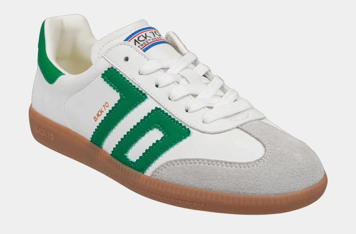 A white sneaker with green stripes, a suede gray toe, and a gum sole—perfect for Memphis style in summer 2025. The shoe features white laces and a "BACK TO" logo on the side and tongue.