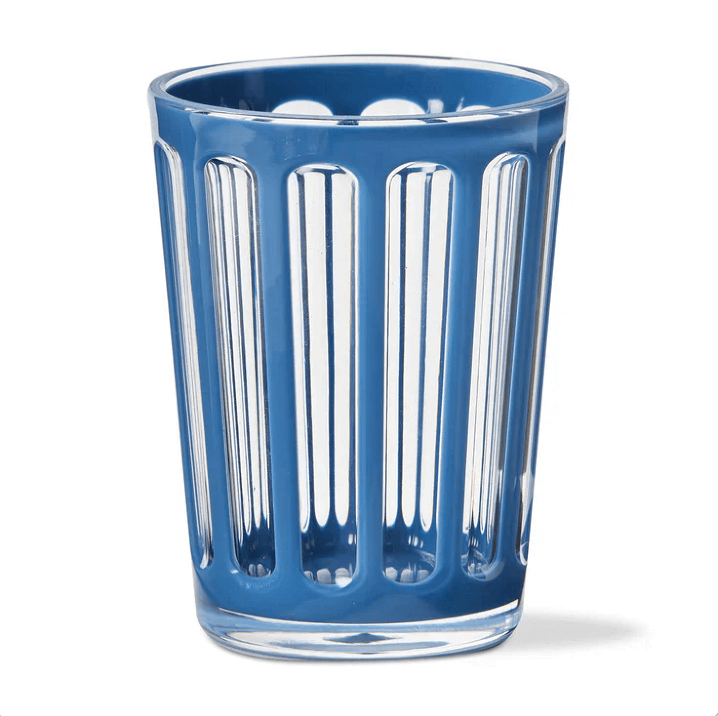 A clear glass tumbler with vertical blue stripes, part of our latest FINDS from Nashville, is evenly spaced around its surface and set against a plain white background.