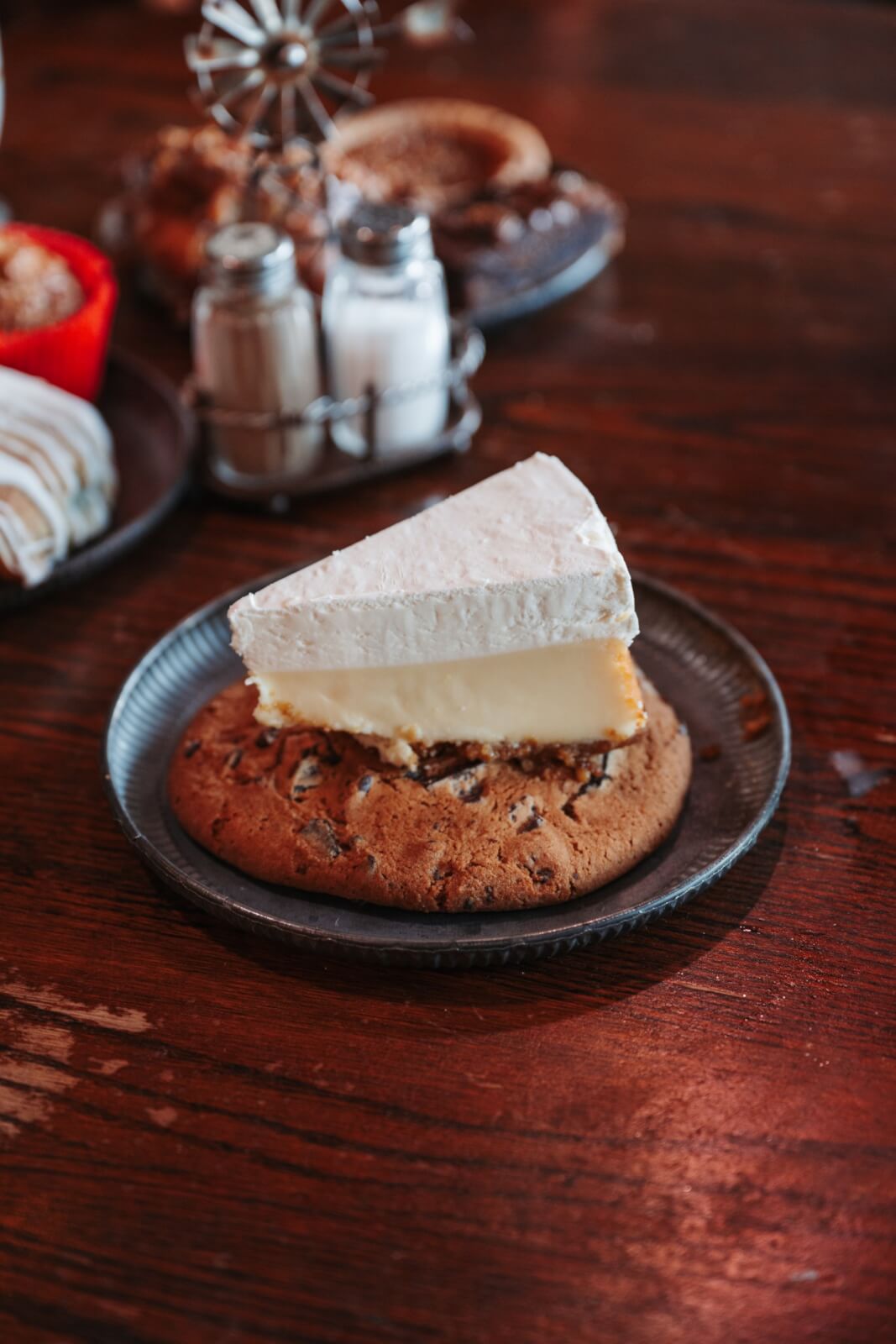 Culinary Road Trip: 4 Tennessee Towns for Food Lovers - 7 A decadent dessert on top of a cookie, on a black plate.