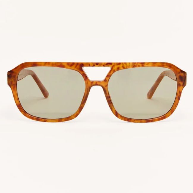 Brown tortoiseshell aviator sunglasses with a thick frame and light-colored lenses, featured as one of the Nashville August FINDS, shown against a plain white background.