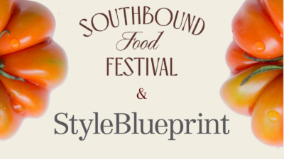 Southbound Food Festival & StyleBlueprint text with large tomatoes partially visible on both sides against a light background, inviting food lovers to experience the ultimate Foodie Getaway in Birmingham, all for just $3,000.