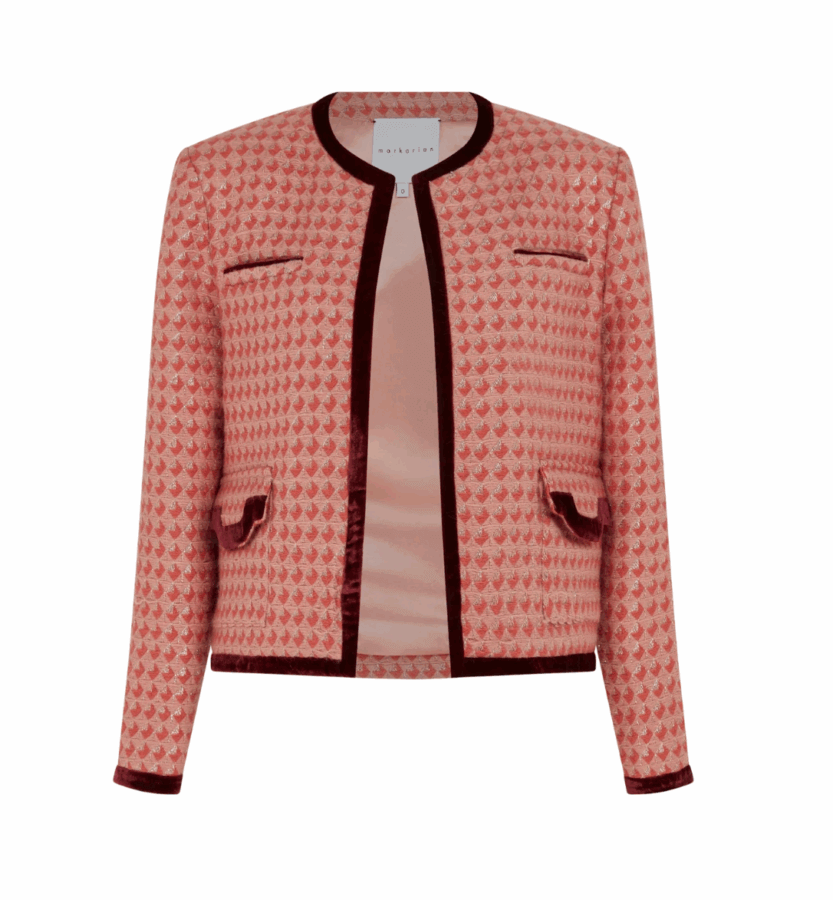 19 Luxurious Birmingham FINDS for the Holidays - 4 A pink patterned women's jacket with burgundy trim, two front flap pockets, and two chest welt pockets, displayed on a plain white background.