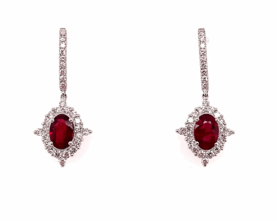 19 Luxurious Birmingham FINDS for the Holidays - 8 A pair of drop earrings featuring oval red gemstones surrounded by small clear stones set in silver-toned metal.