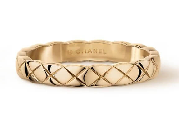 23 Luxurious Nashville FINDS for Holiday 2025 - 11 A gold ring with a quilted pattern and the word "CHANEL" engraved on the inner band, perfect for adding Holiday Luxe vibes to your 2025 style.