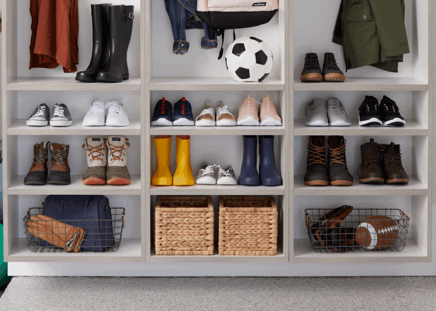 Custom Organization Ideas Homeowners Are Loving Right Now - 5 Shoe cubbies thoughtfully organizing shoes, coats, boots, and sporting equipment.