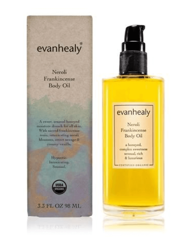 50 Under $50: Your Nashville Holiday Gift Guide - 39 A bottle of evanhealy Neroli Frankincense Body Oil with its box beside it; the 3.3 fl oz (98 ml) pump dispenser makes a perfect addition to any Holiday Gift Guide or thoughtful Nashville-inspired gift set.