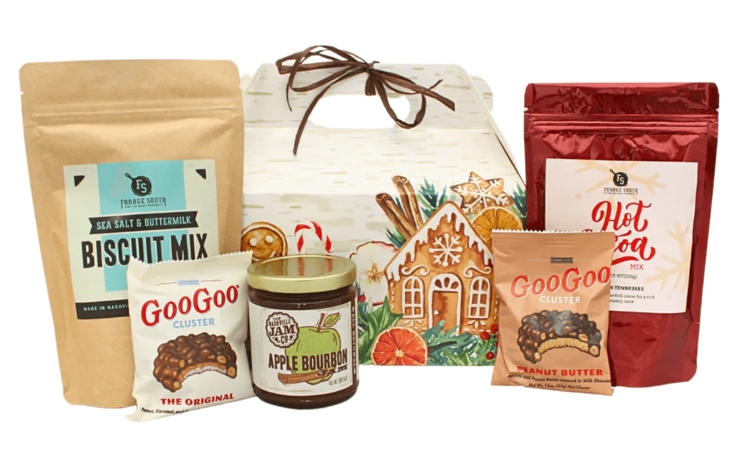 50 Under $50: Your Nashville Holiday Gift Guide - 34 Featured in our Holiday Gift Guide, this Nashville-inspired gift set includes gingerbread house packaging, sea salt & buttermilk biscuit mix, hot cocoa mix, apple bourbon jam, and two Goo Goo Cluster candiesβall for gifts under $50.