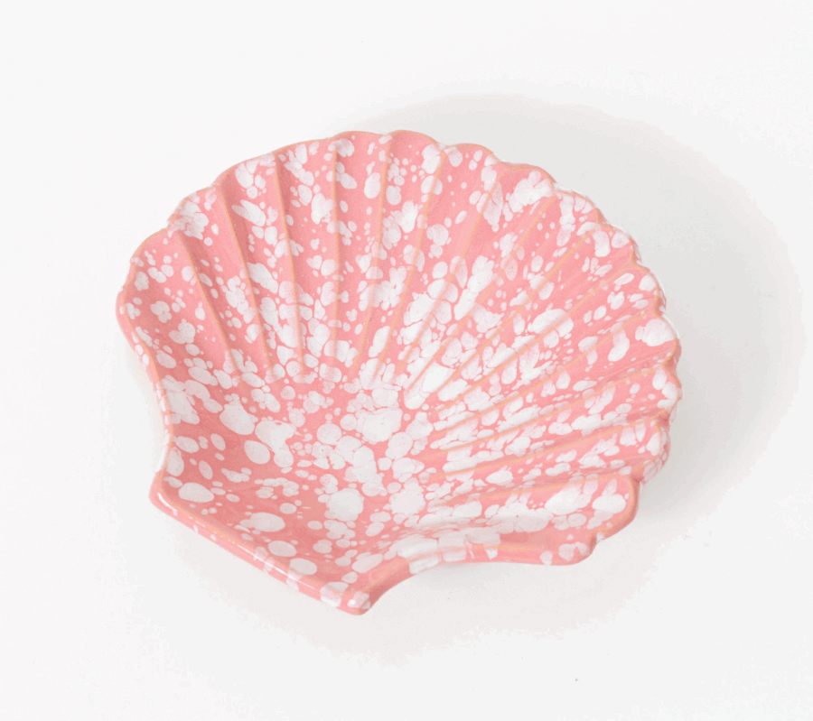50 Under $50: Your Nashville Holiday Gift Guide - 2 A pink ceramic dish shaped like a seashell with white speckled patterns, set against a plain white backgroundβperfect for gifts under $50 or adding Nashville charm to your holiday gift guide.