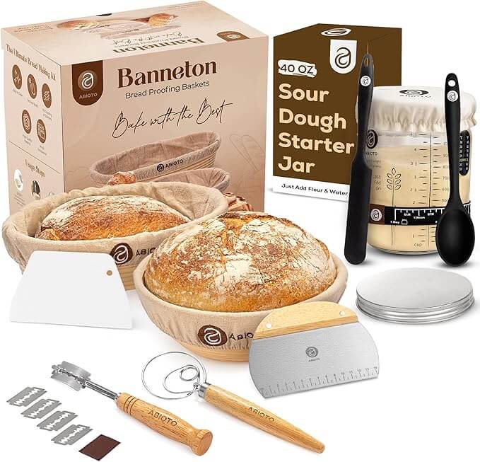 10 Gifts For Bakers Under $100 - 3 A perfect baker gift, this sourdough bread starter kit includes proofing baskets, baked bread, a jar, dough tools, measuring spoon, bread lame, scraper, and a βBanneton Bread Proofing Basketsβ boxβideal for gifts under $100.