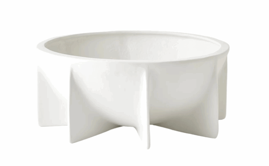 19 Luxurious Birmingham FINDS for the Holidays - 17 White ceramic bowl with a round shape and wedge-like ridges extending outward from the base, set against a plain white background—a piece Birmingham Luxe loves for its elegant simplicity.