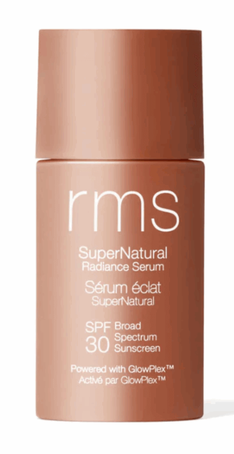 17 Birmingham FINDS for the New Year - 11 A copper-colored bottle of RMS SuperNatural Radiance Serum with SPF 30 Broad Spectrum Sunscreen, featuring white text and a matte finish.