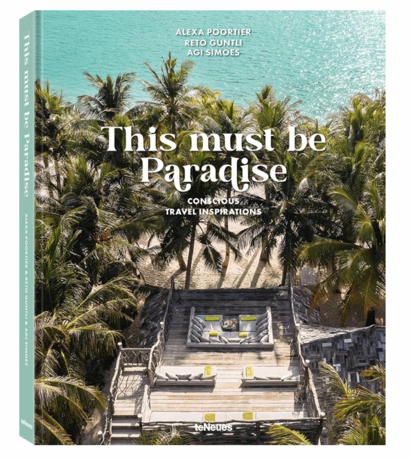 17 Birmingham FINDS for the New Year - 16 Cover of the book "This must be Paradise" featuring a tropical deck surrounded by palm trees and overlooking turquoise water—a perfect New Year escape far from Birmingham. Authors' names appear at the top.