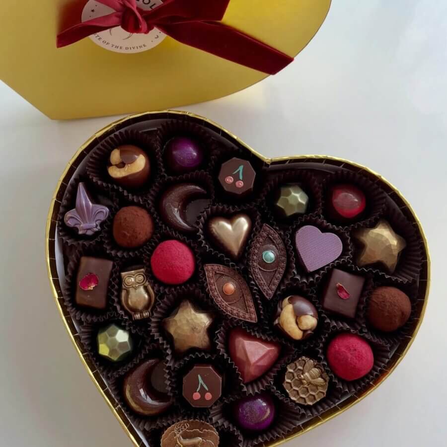 4 Decadent BHAM Chocolate Shops You Need to Know About - 2 A heart-shaped box filled with decadent chocolate truffles and Valentine’s Day chocolates, all arranged in neat rows, makes a perfect gift inspired by Magic City chocolate shops.