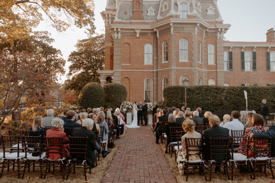 An Elegant Memphis Wedding at The Historic James Lee House - 13 A wide view of an outdoor wedding ceremony at The James Lee House.