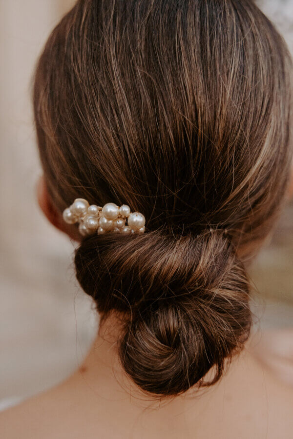An Elegant Memphis Wedding at The Historic James Lee House - 5 A close up of the bride's updo hairstyle.