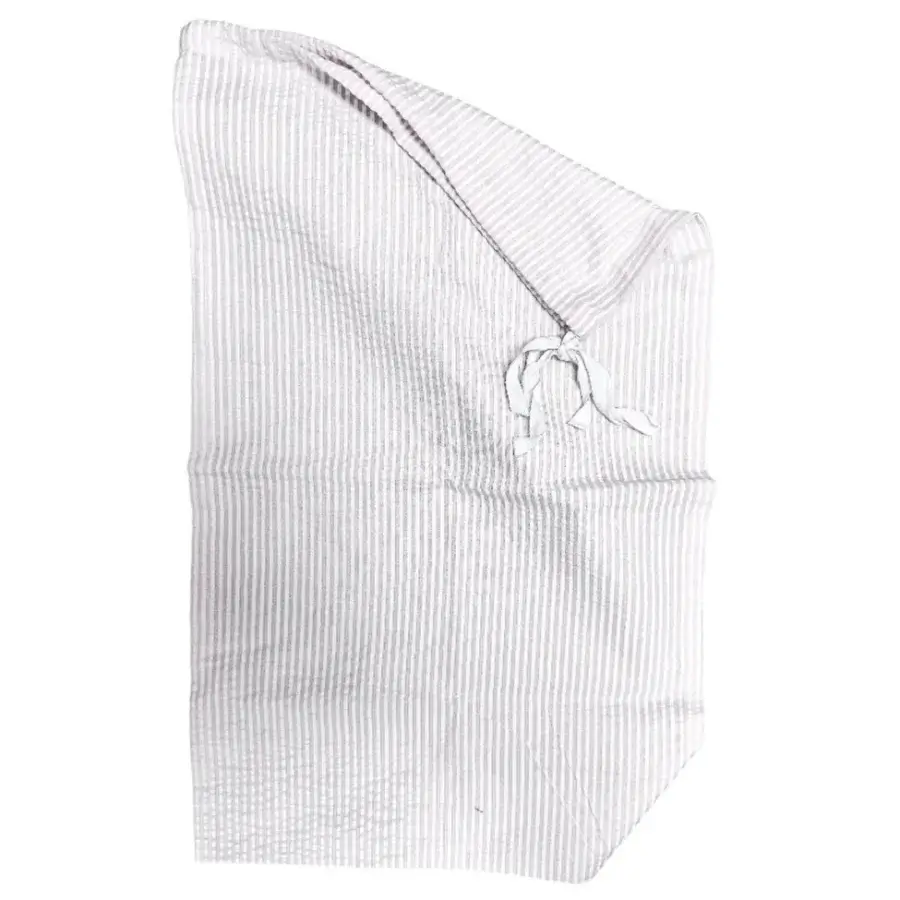 15 Memphis FINDS to See You Through January - 12 A light gray and white striped cloth wrap with a tie closure, displayed flat on a white backgroundβperfect for your latest Memphis finds or refreshing your style for the New Year.