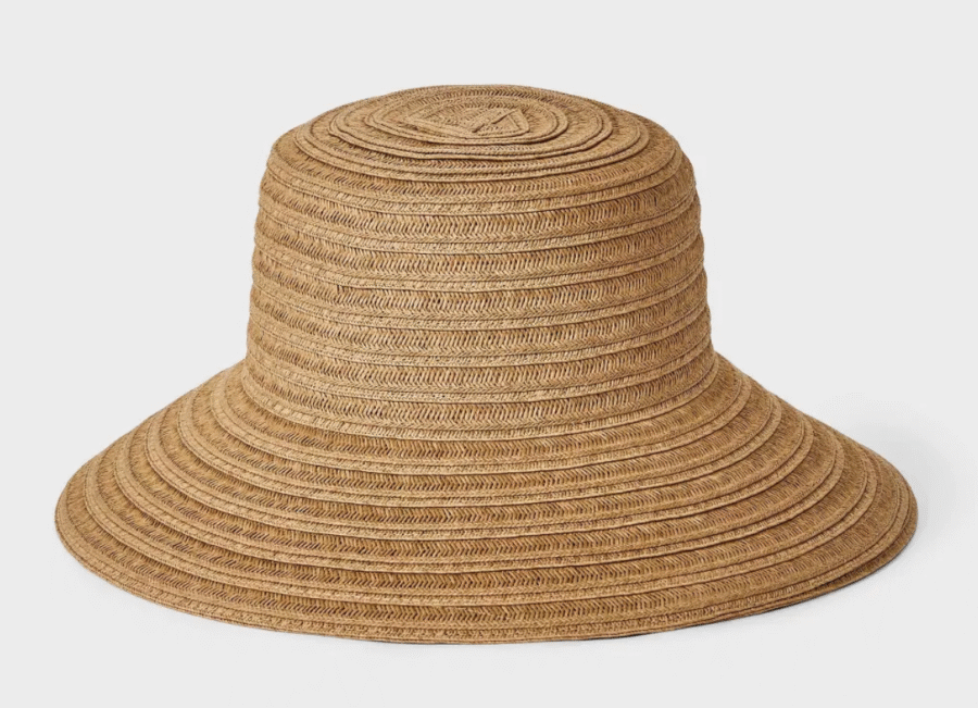 8 Crushable Hats, Perfect for Travel - 7 A wide-brimmed, dome-shaped straw hat with concentric circular patterns, this stylish piece is perfect for those seeking packable hats, displayed on a plain white background.