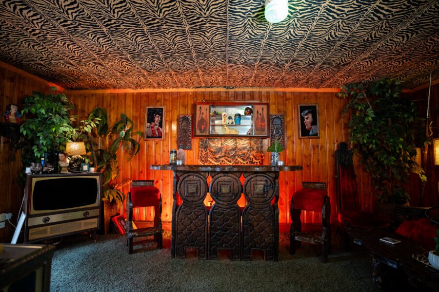 Lil' Graceland: An Elvis-Inspired Retreat Just Minutes from the Real Deal - 3 A room is "dressed up" like Graceland, with animal print ceiling and Elvis-themed furnishings.