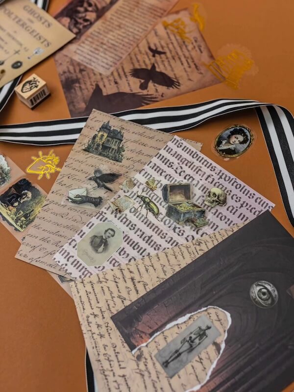 9 New Nashville Retail Spots to Explore - 3 Several vintage-style papers with handwritten text and illustrations—portraits, animals, and architecture—are spread out on a brown surface with a black-and-white ribbon.