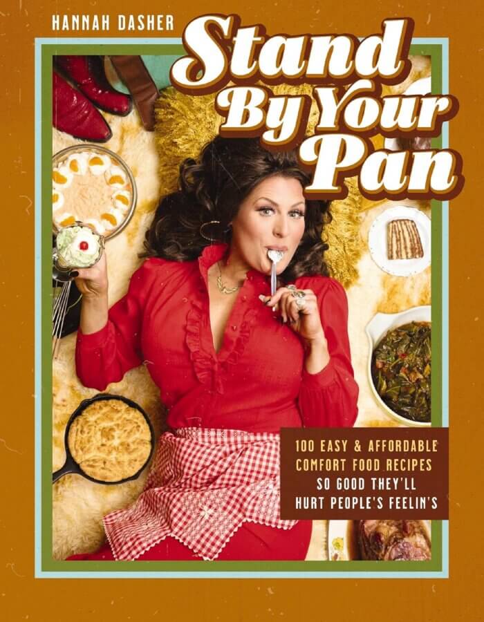 Stand By Your Pan! 3 Recipes to Help You Getchyo' Man (and Keep Him) - 6 A woman in a red dress lies on a rug surrounded by comfort food dishes, holding a cupcake and licking her finger. Text reads: “Stand By Your Pan” by Hannah Dasher—serving up recipes to get a man and keep your man satisfied.