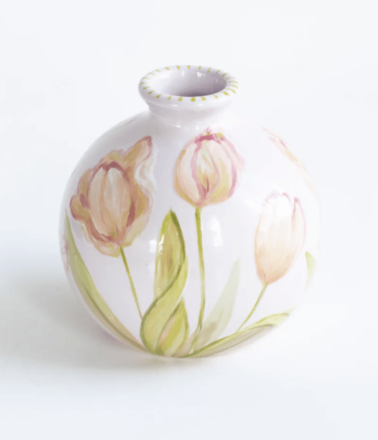 19 Fresh FINDS Around BHAM: Closet Refreshers, Entertaining Picks & More - 11 Round white ceramic vase decorated with hand-painted pink tulips and green leaves, photographed against a plain white background.