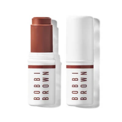 18 Nashville FINDS We're Loving This Month - 10 A FINDS Draft from March 2026: A brown makeup stick with white packaging and "Bobbi Brown" printed in red, shown with the cap off and on.