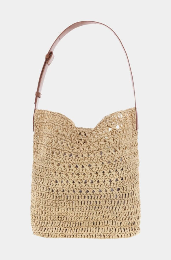 18 Nashville FINDS We're Loving This Month - 6 Beige woven straw shoulder bag with a wide brown adjustable leather strap, featured as a FINDS Draft from March 2026, displayed against a plain white background.