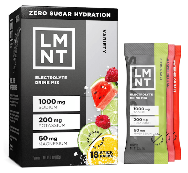 12 In-Flight Plane Accessories You Need - 13 Box of LMNT electrolyte drink mix variety pack with 18 stick packs—an ideal choice for your plane accessories—featuring 1000mg sodium, 200mg potassium, 60mg magnesium, and three visible flavor packets.