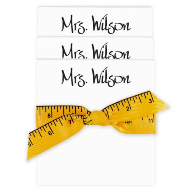 18 Birmingham FINDS for May Celebrations: Graduation, Mother's Day & More - 8 Three white cards labeled "Mrs. Wilson" are stacked, tied with a yellow measuring tape ribbon—a charming FINDS from Birmingham perfect for May celebrations.