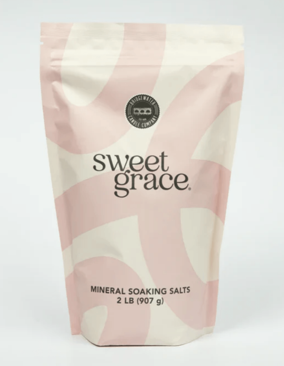 18 Birmingham FINDS for May Celebrations: Graduation, Mother's Day & More - 16 A pink and cream resealable bag labeled "Sweet Grace Mineral Soaking Salts, 2 lb (907 g)" stands upright against a plain background—an elegant Birmingham FINDS discovery for self-care in May.