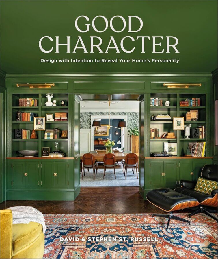 9 New Design-Forward Coffee Table Books for Your Wish List - 9 The cover of "Good Character"—a 2026 coffee table book—shows a green-walled living room with built-in bookshelves, a patterned rug, and a view into a dining room that’s pure design envy.