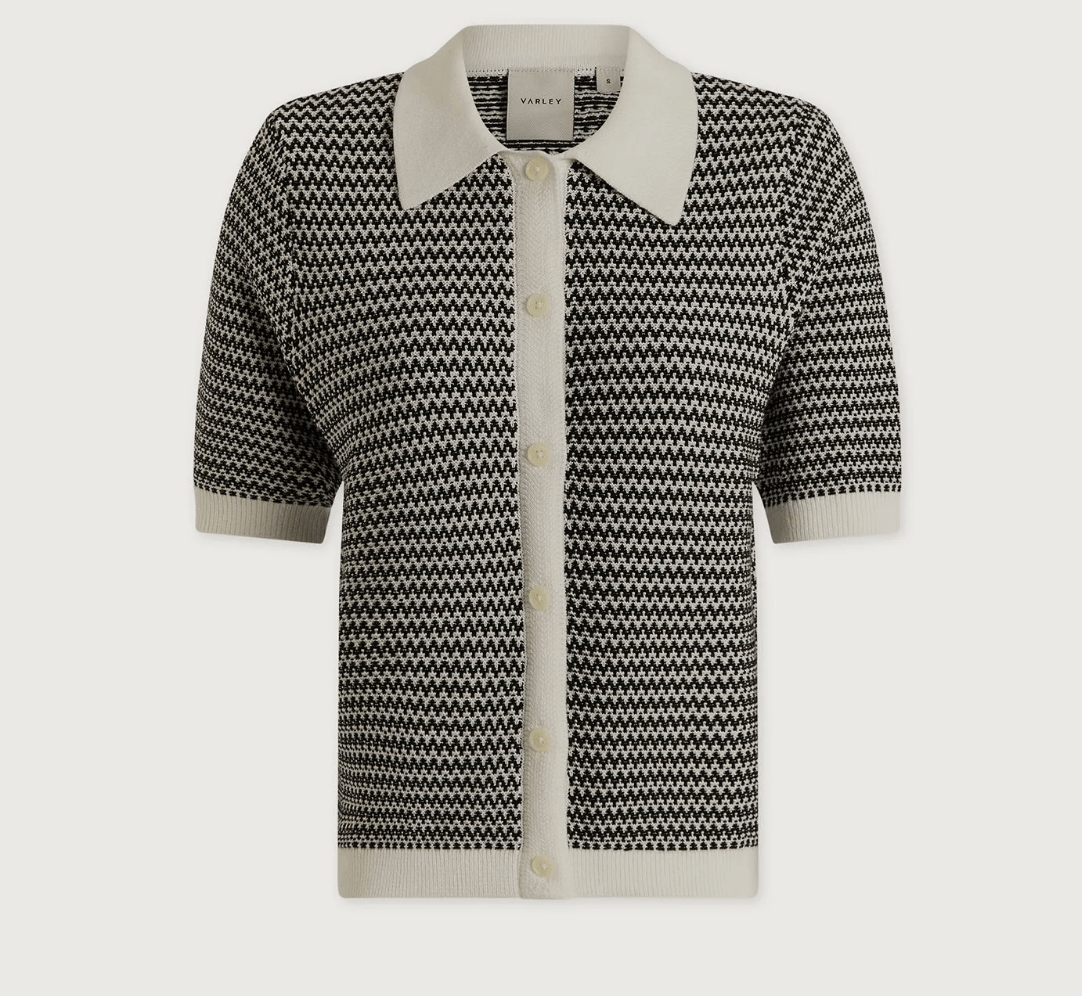 15 Louisville FINDS for May: Spring Fashion, Entertaining Essentials & More - 4 A short-sleeve, black and white zigzag patterned button-up cardigan with a white collar and trimβone of our May FINDS in Louisville.