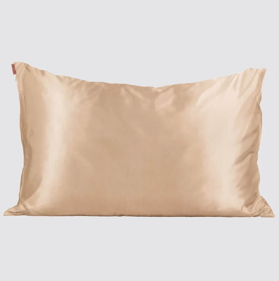 15 Memphis FINDS for May: Mother's Day & Spring Celebrations - 16 A beige satin pillowcase is shown against a plain light background, perfect for elevating your bedroom decor after your latest memphis shopping adventure.