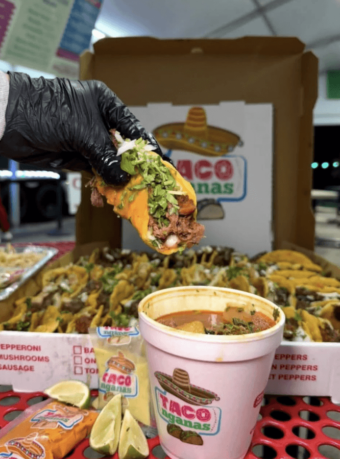 5 New Memphis Restaurants to Try This Month (+ What's Coming Soon!) - 7 A gloved hand holds a beef taco above a cup of broth, with a box of tacos, lime wedges, and branded Taco packaging in the background.