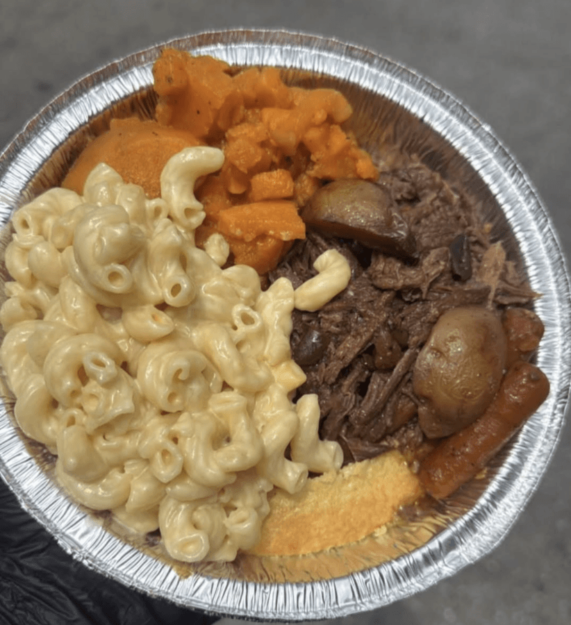 5 New Memphis Restaurants to Try This Month (+ What's Coming Soon!) - 3 A round aluminum container holding macaroni and cheese, pot roast with mushrooms and carrots, sweet potatoes, and cornbread.