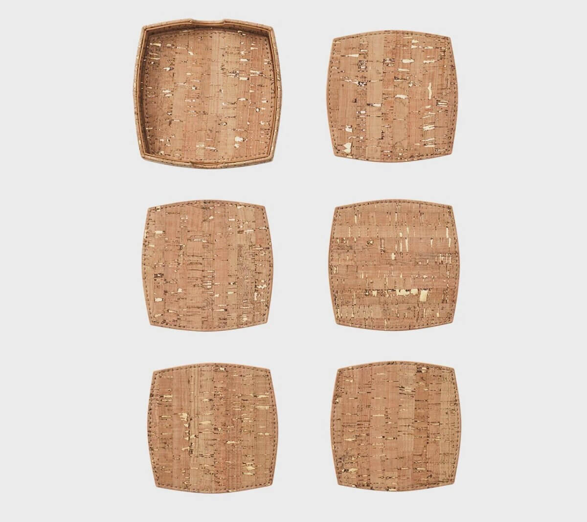 20 Spring FINDS for Mother’s Day & Beyond: Style, Beauty & Home Must-Haves - 18 Six square cork coasters arranged in two columns of three, with the top left coaster enclosed in a matching cork holder, set against a plain white background—perfect for your FINDS Draft or gatherings in Nashville.
