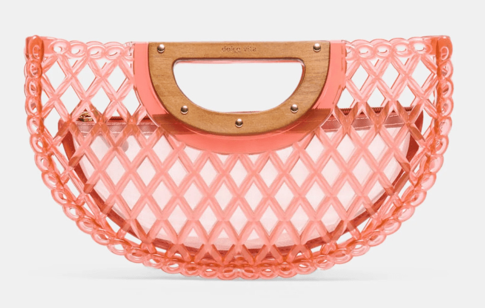 A pink, semi-circular lattice handbag with a wooden handle, displayed against a plain background—perfect for those who love colorful bags.
